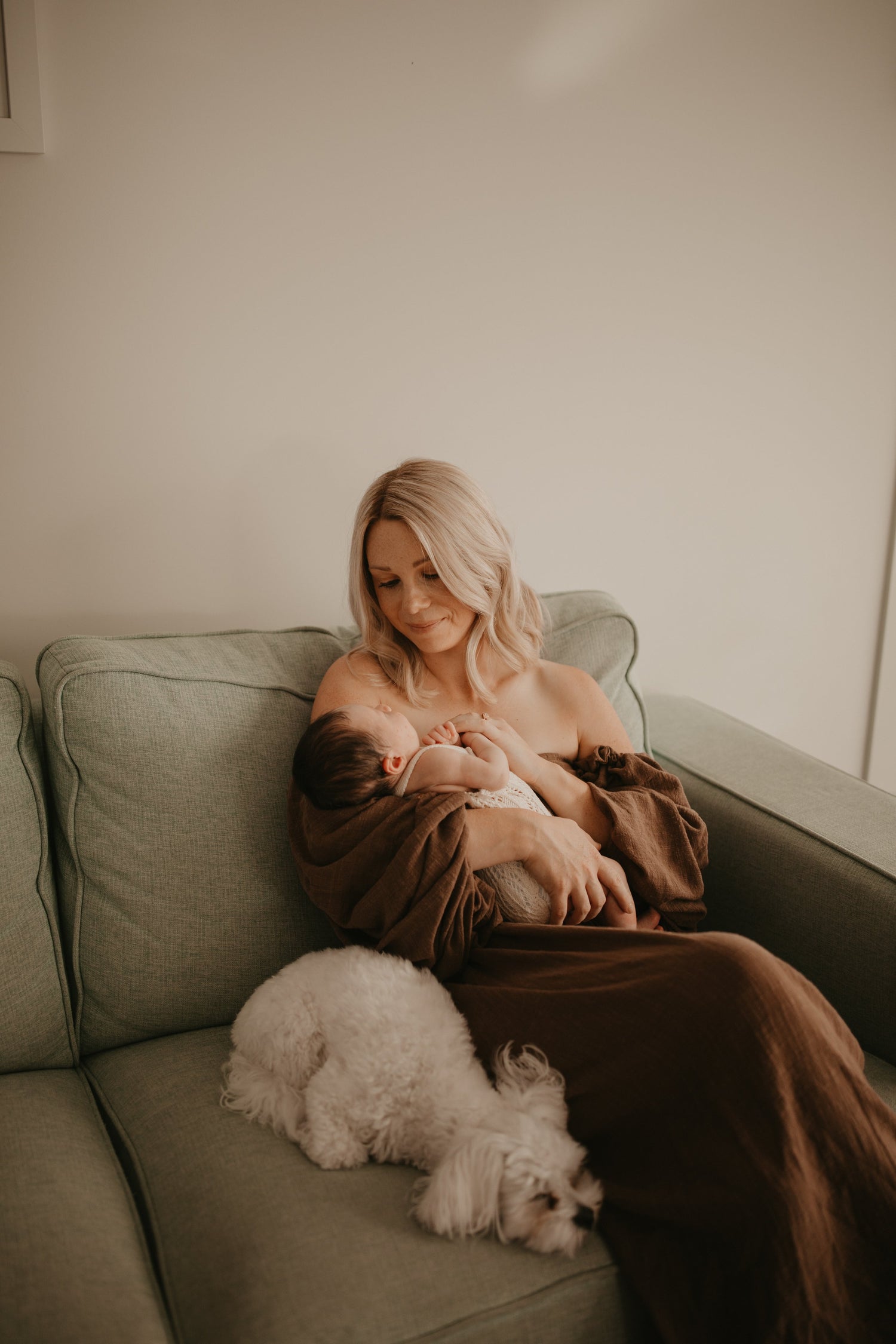 Courtney holding newborn Isabelle - Mama & Bell